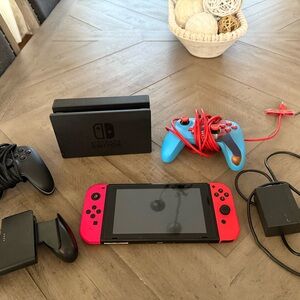 Nintendo switch plus remotes & 1 game